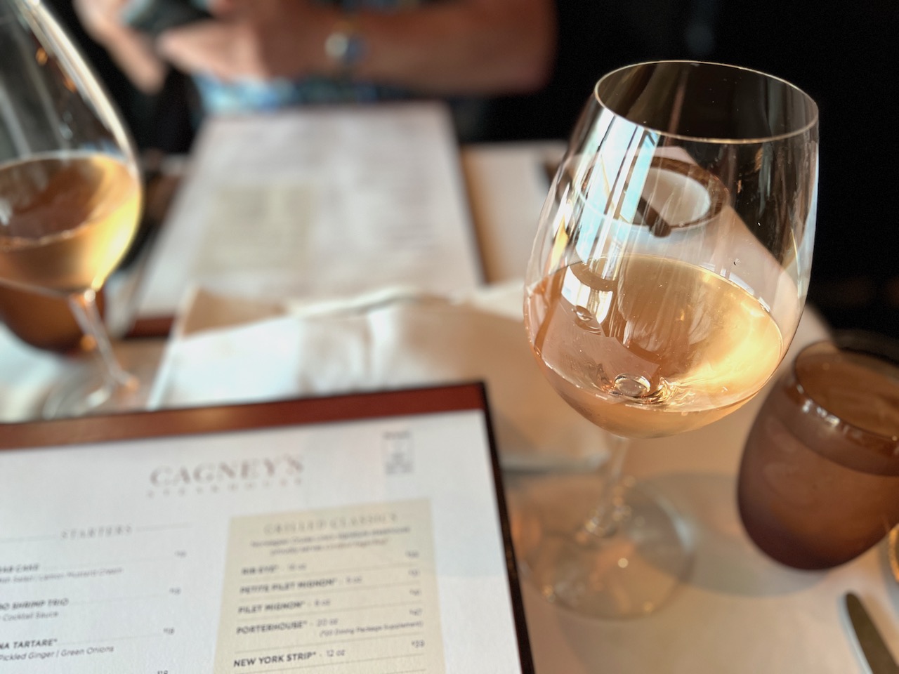 Cagneys menu with wine