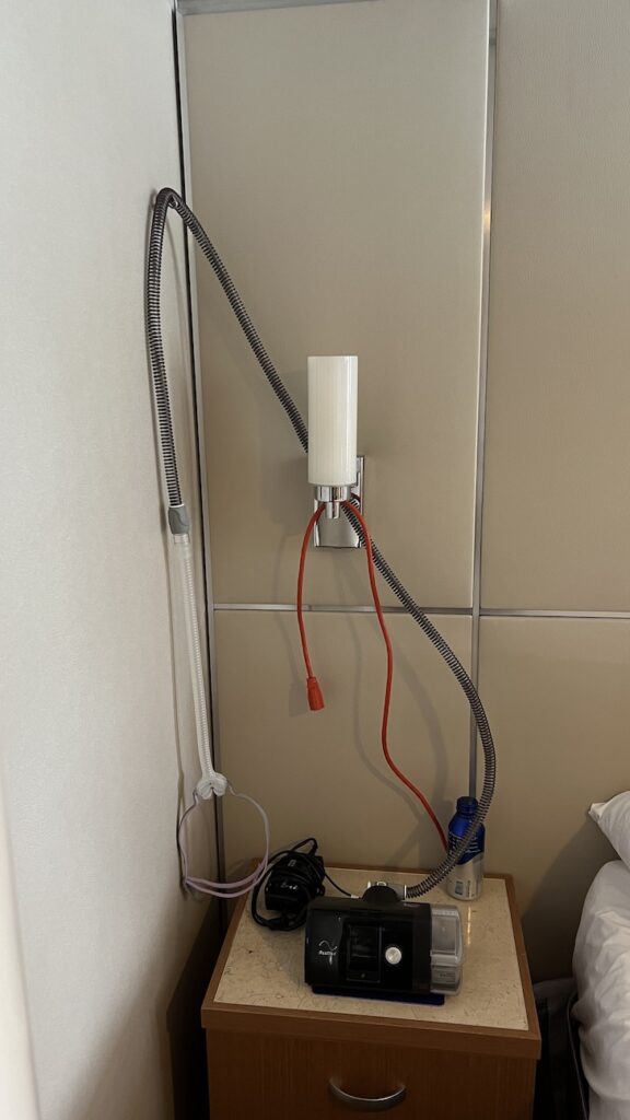 Magnetic hook with CPAP hose 1