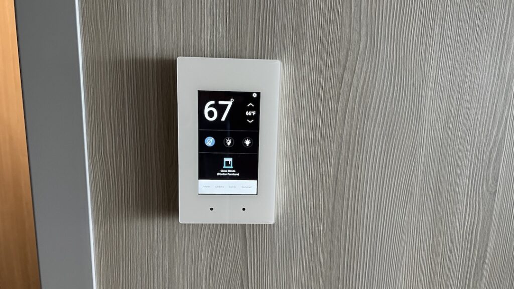 Advanced technology amenities in Celebrity Ascent Sky Suite include a wall-mounted LCD control for temperature, lighting, and draperies.