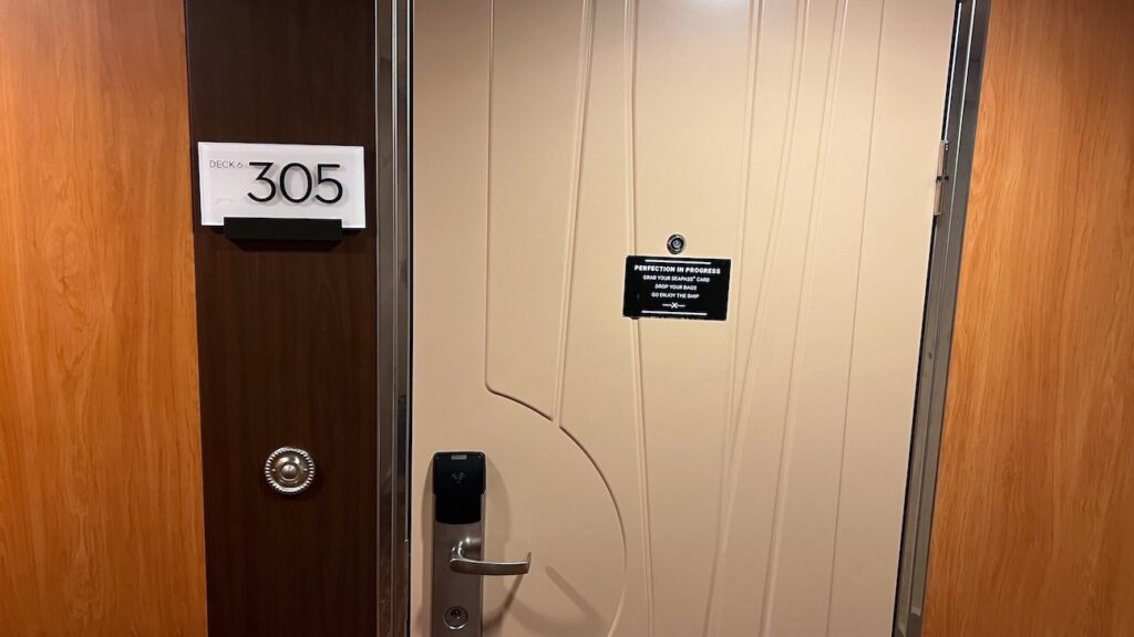 Door leading to cabin 6305, a Celebrity Equinox sunset sky suite.